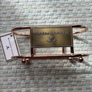 MacKenzie-Childs Lotion Caddy NWT with plaque & copper-colored frame 6x3x2-1/2”.
